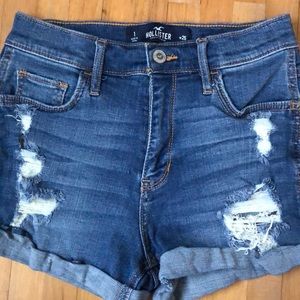 Medium wash High Rise jean shorts.